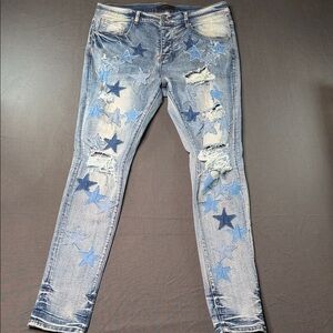 AMIRI Blue Star-Embellished Distressed Skinny Jeans